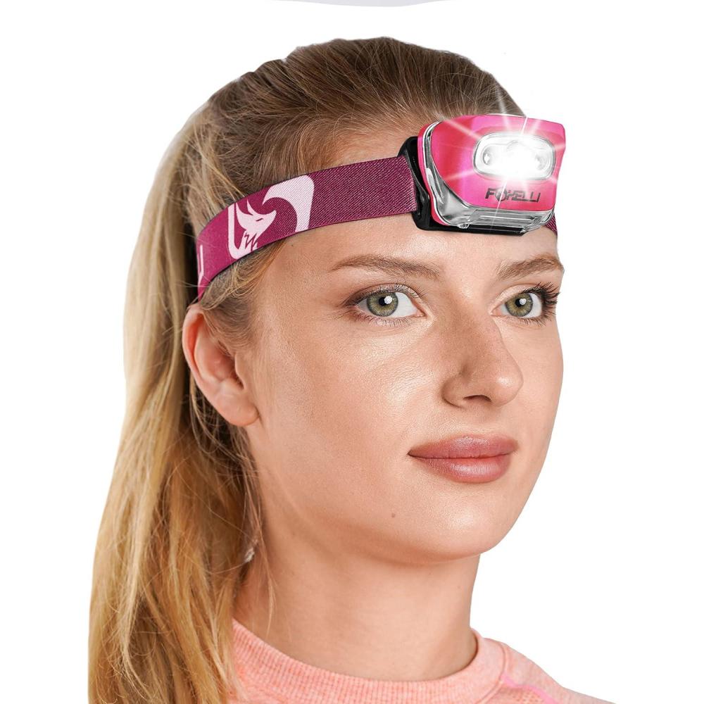 imageFoxelli LED Headlamp Flashlight for Adults ampamp Kids Running Camping Hiking Head Lamp with White ampamp Red Light Comfortable Headband Lightweight ampamp Waterproof 3 AAA BatteriesNeon Pink